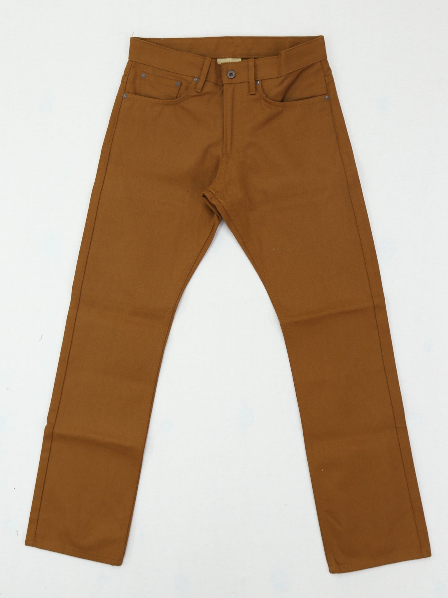 Brown canvas pants on a white background