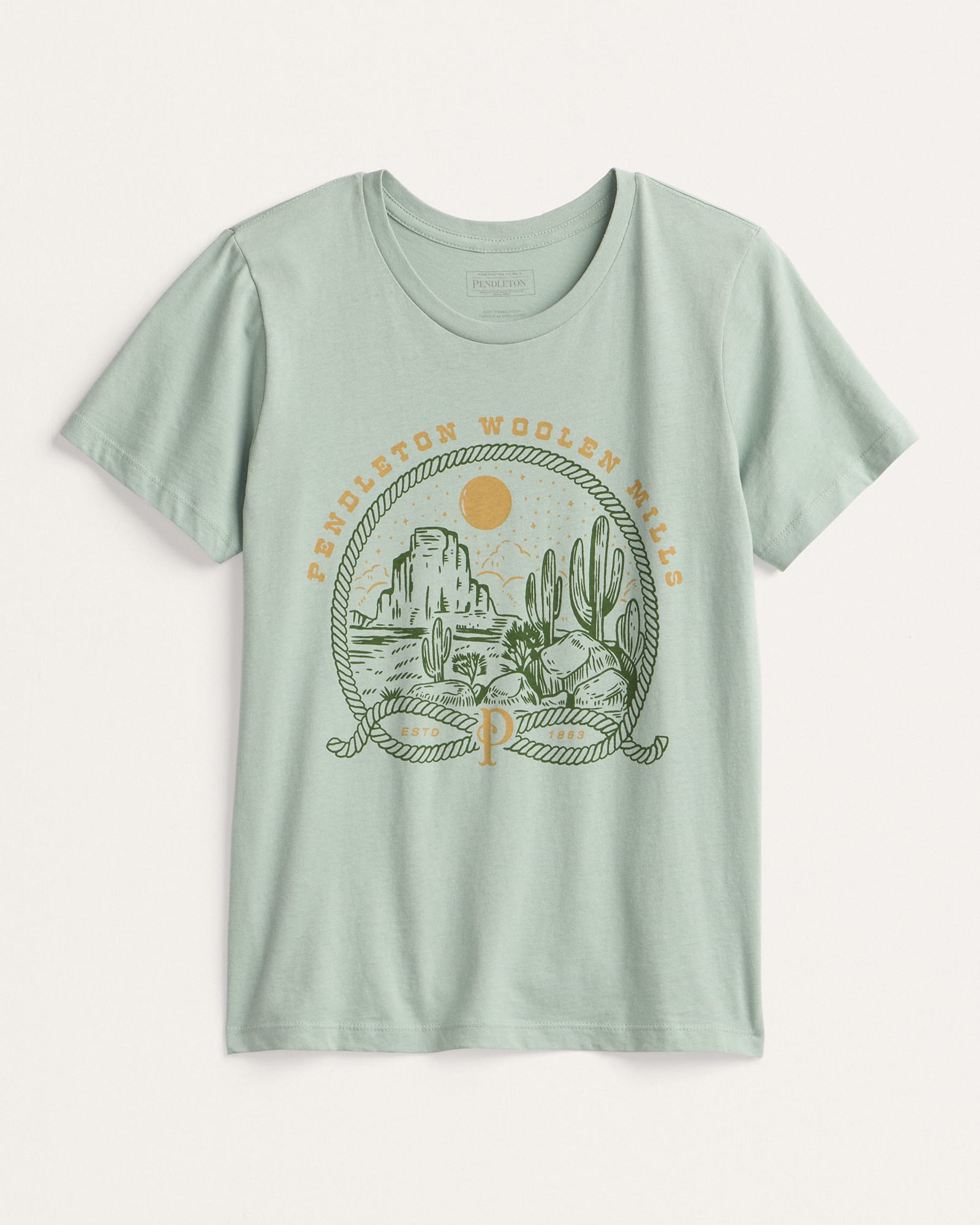 Light green t-shirt with desert graphic and text on a white background