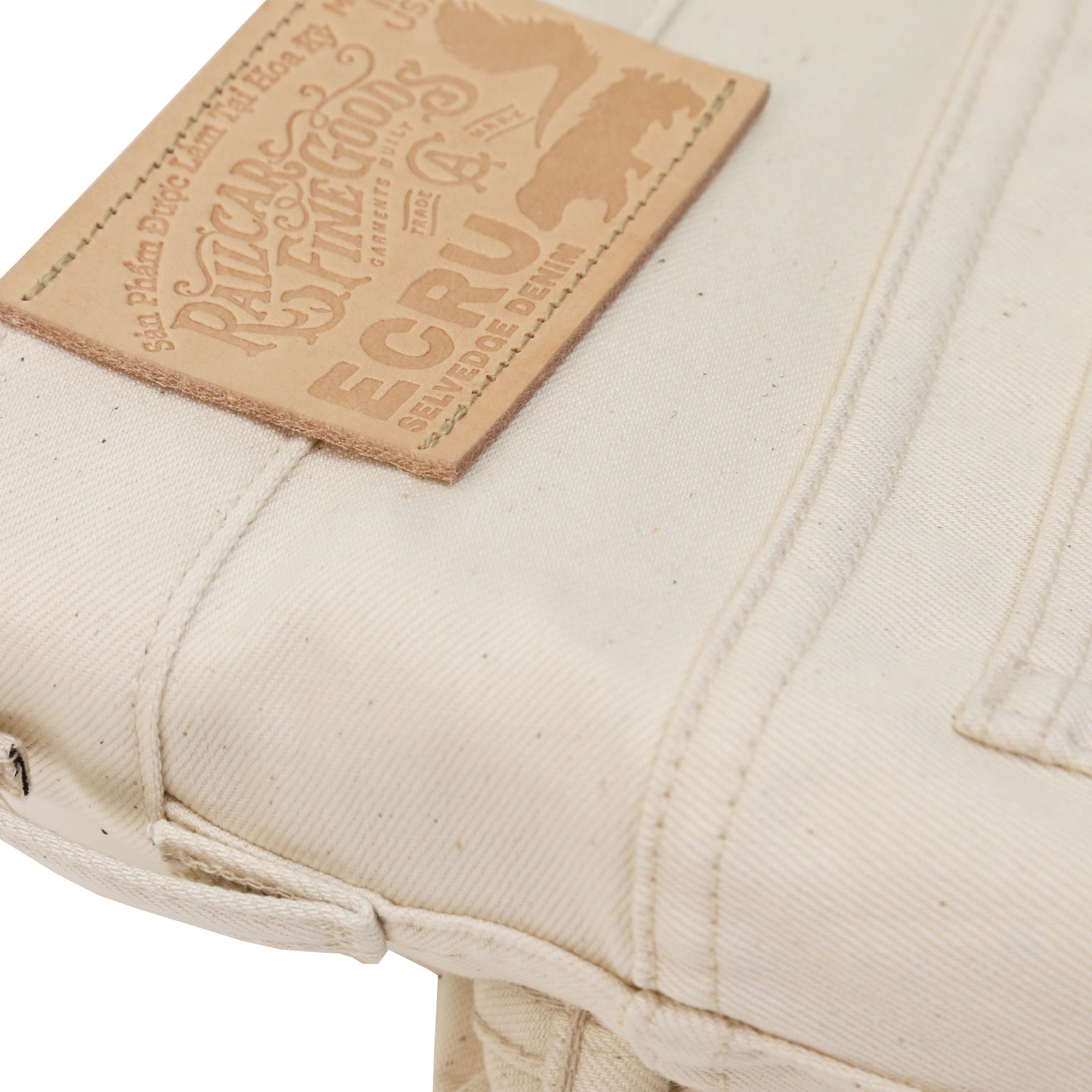 Leather Detail of X105 12 Oz Ecru Natural Selvedge