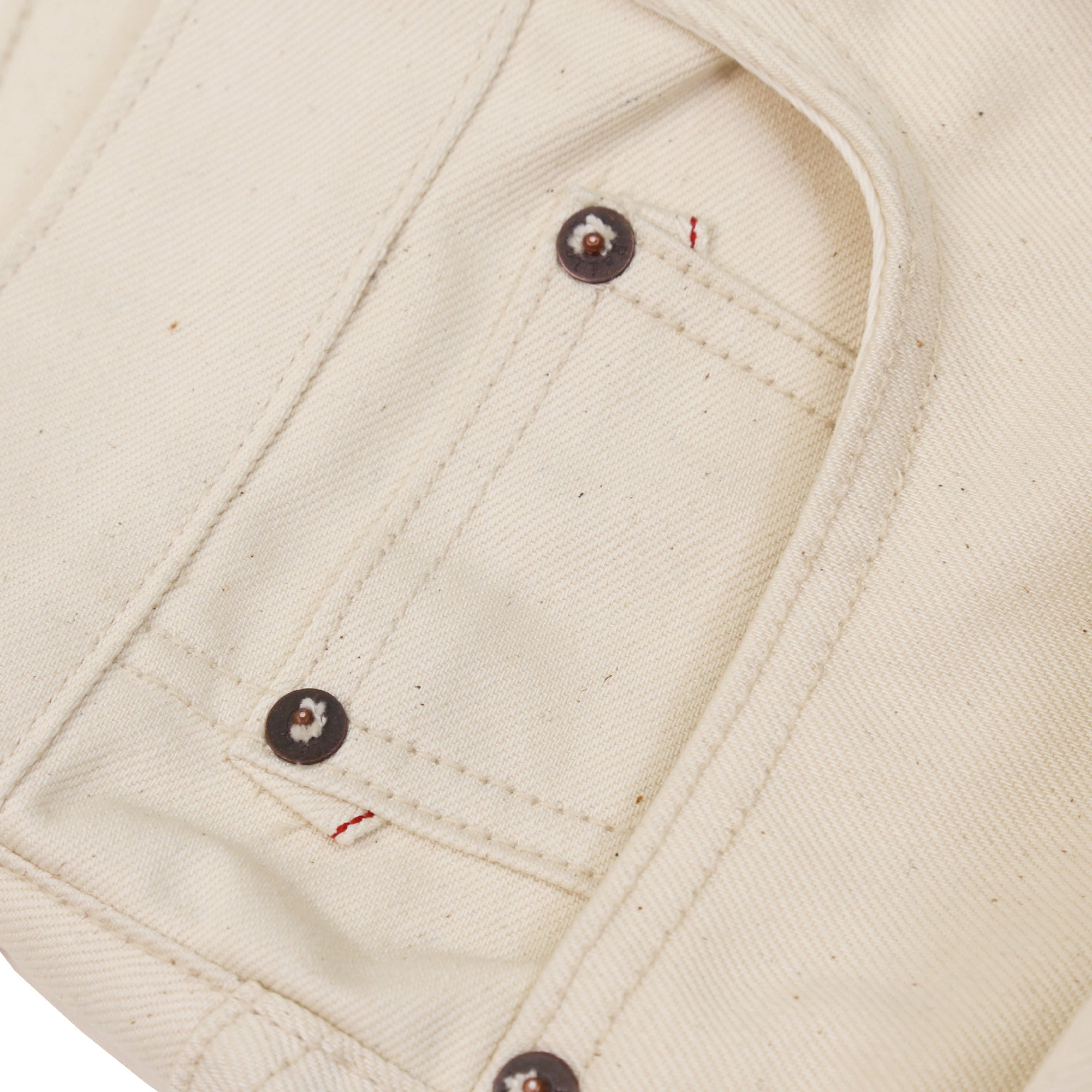 Coin Pocket Peek-a-boo Selvedge Detail of X105 12 Oz Ecru Natural Selvedge