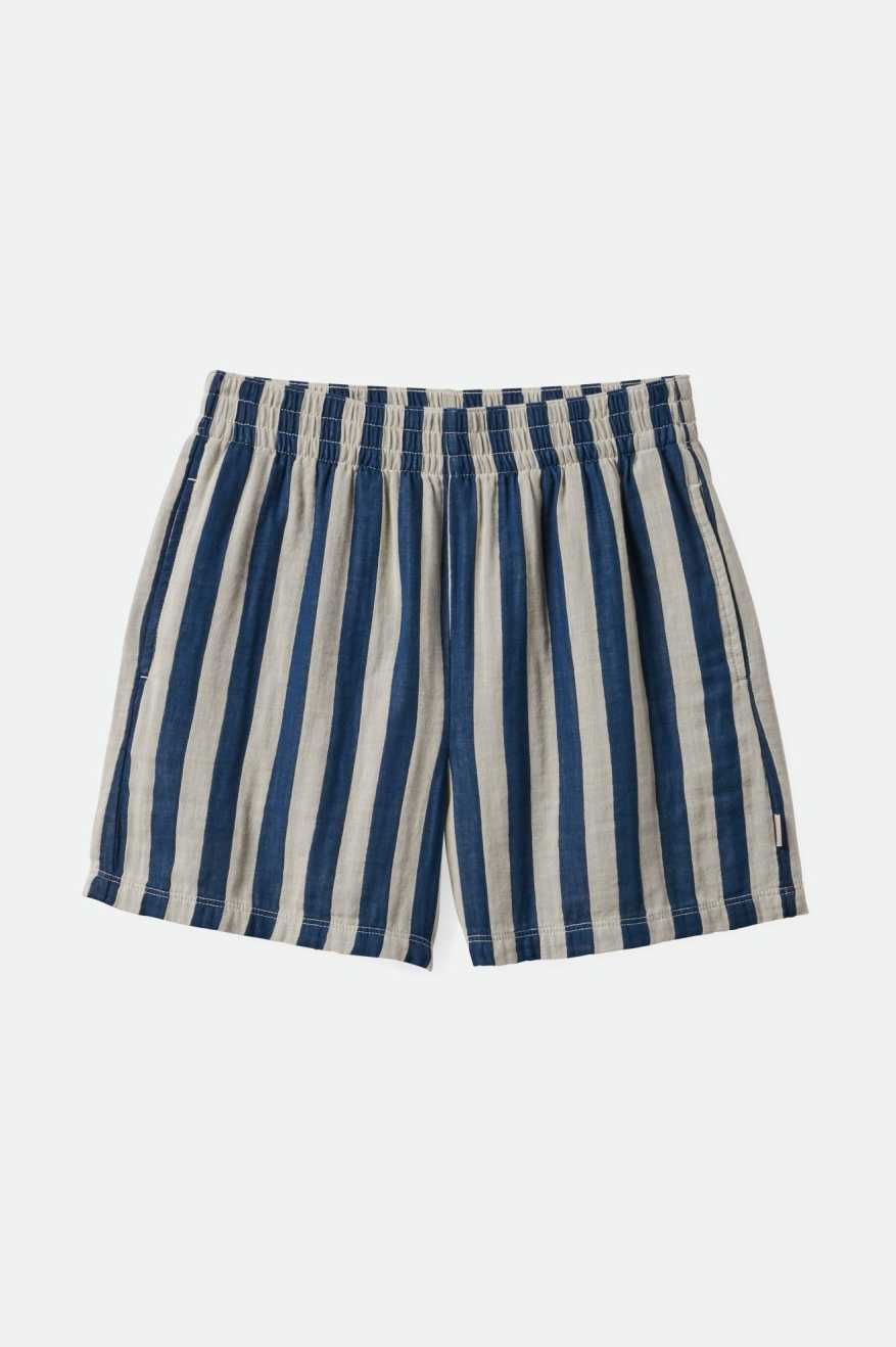 A pair of Brixton Mykonos Stripe Boxer Shorts in a deep sea color with vertical blue and white stripes, featuring a elastic waistband and side seam pockets.